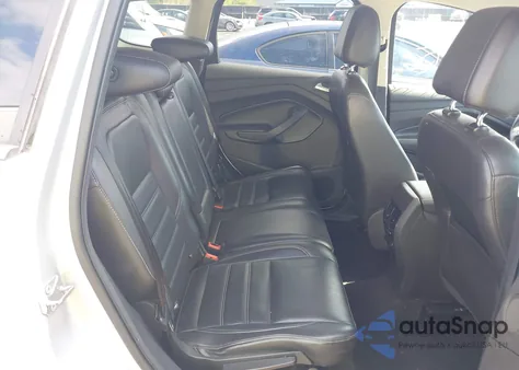 2017 Ford Escape Titanium z USA, uszkodzony, nr VIN 1FMCU0JD0HUD09406